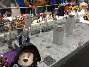 Cecil poses next to "Just like Beggar's Canyon" on the first day of Brickworld Indy.