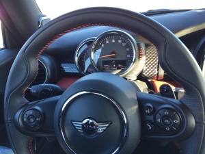 The steering wheel with the speedometer/tachometer cluster on top.  The lights on the right side of the speedometer are the fuel gauge